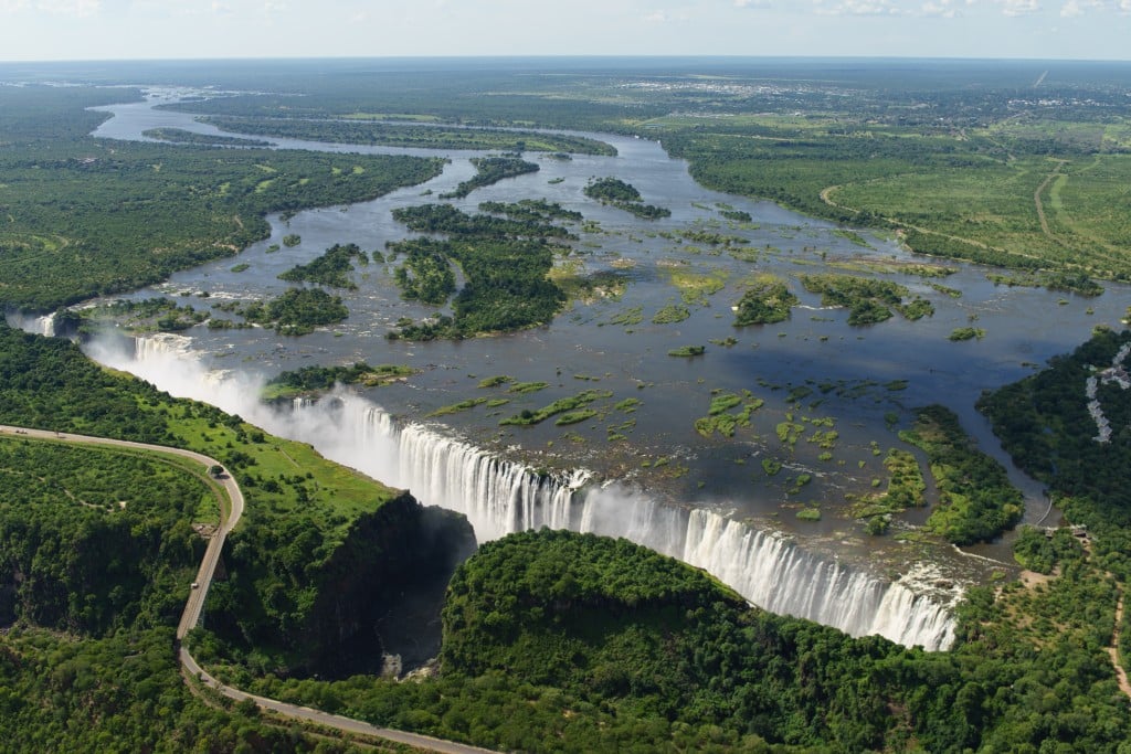 Victoria Falls is the largest waterfall in the world, and with such a massive wall of water, the best view is seen from a scenic helicopter flight. 