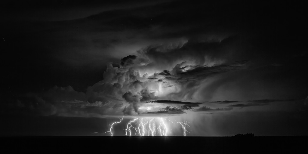A distant thunderstorm rumbles and throws down tons of bolts west of the small community of Wilaha in northern Arizona.