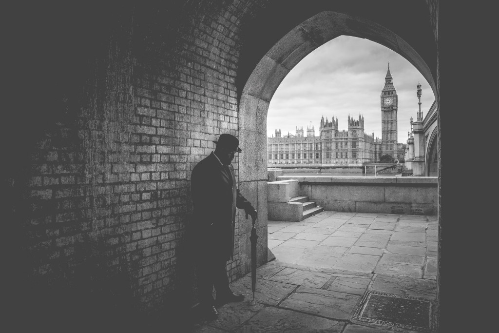 The Bowler Man stands on the opposite side of Westminster, London, where the UK government discuss politics and the nations future.