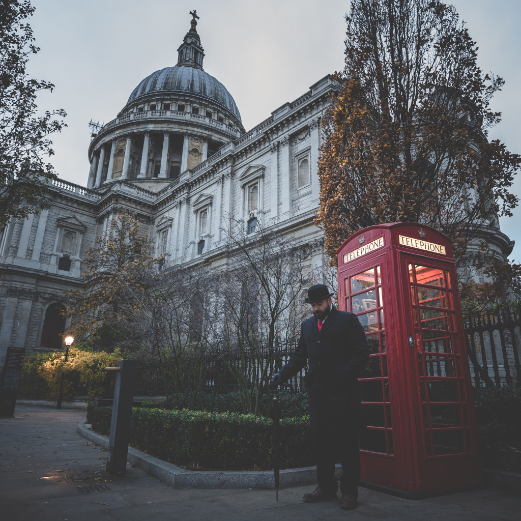 The Bowler Man outside St Pauls Cathedral. Next to one of those famous red telephone boxes.