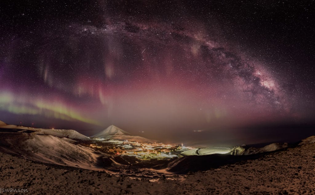 June 7 2016 this is a HDR mosiac panoramic. 39 exposures taken to pull this off. This over looks McMurdo Station with Auroras. In the distance Pegasus and Phoenix airfiels lights are visible.